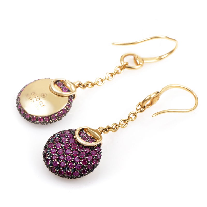 These charming Gucci earrings are an accessory you surely don’t want to miss out on; the set is made of exemplary 18K yellow gold and boasts rolo chain onto which the main decoration is set, entirely paved with vibrant rubies.
Retail Price: