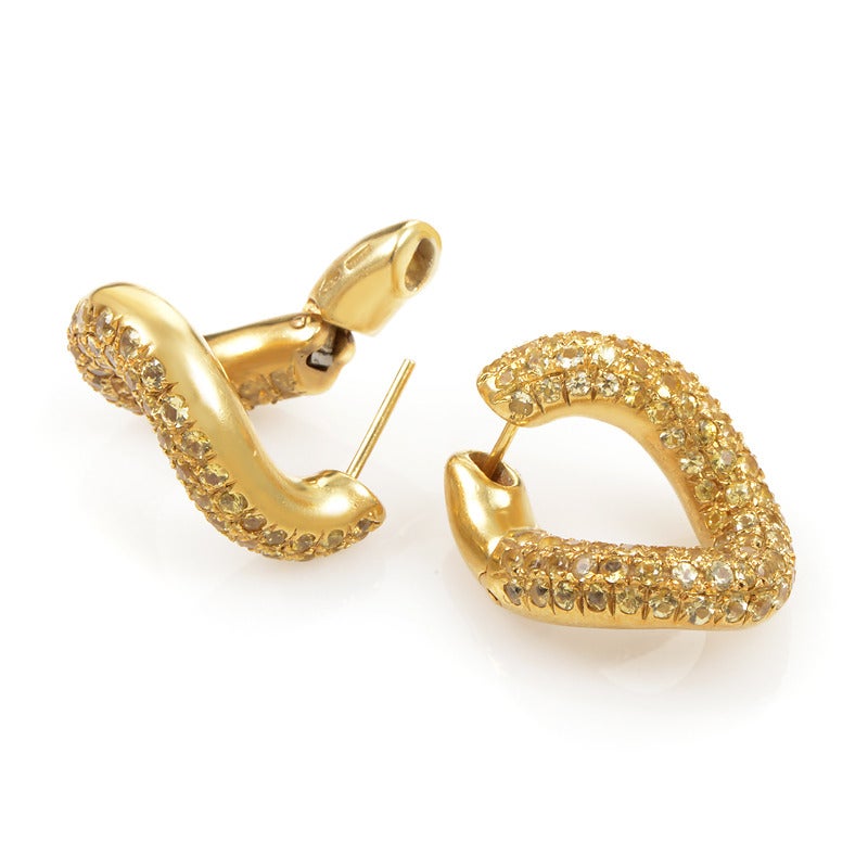 Offbeat and vivacious, these earrings would be an attractive addition to any look; designed by Pomellato, they are stunningly crafted from 18K yellow gold, their curved bodies entirely paved with gorgeous yellow sapphires.
Retail Price: $7,000.00