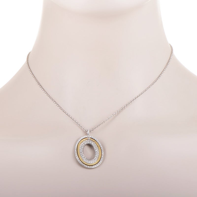 Diamonds and gold come together in harmony to create this eye-catching pendant necklace from Marco Bicego. The necklace is made of 18K white gold and boasts a pendant made of a combination of white and yellow gold. Lastly, the pendant is accented