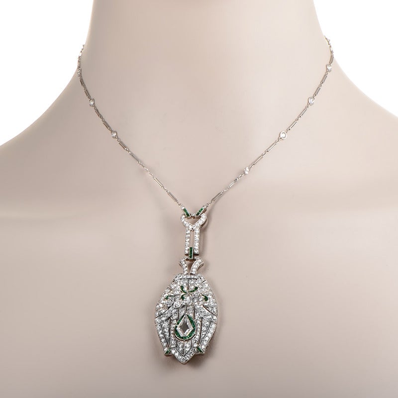 This antique pendant necklace is absolutely breathtaking and boasts an ornate design that is unlike any other! The necklace is made of platinum and is studded with round diamonds. Lastly, a large pendant set with diamonds of varying shapes and sizes