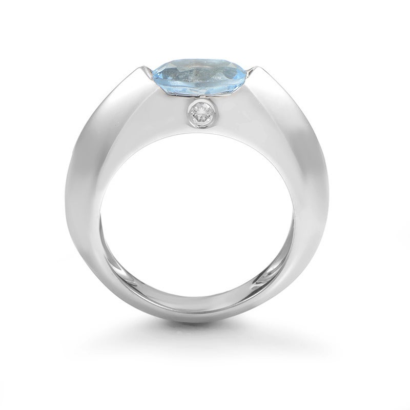 Attractive, imaginative design and impeccable craftsmanship characterize this impressionable Piaget ring made of exemplary 18K white gold, decorated with gleaming topaz stone and 0.05ct diamond stone.
Ring Size: 7.75 (55 7/8)