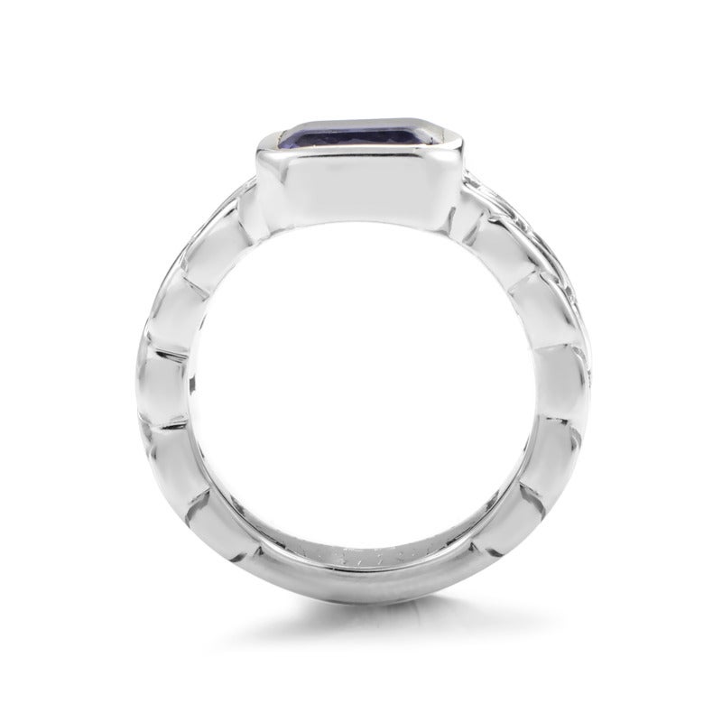 A bold, attractive design by Chanel featuring chain-inspired body wonderfully made from 18K white gold, embellished with a spectacular iolite stone.
Ring Size: 5.75 (50 7/8)