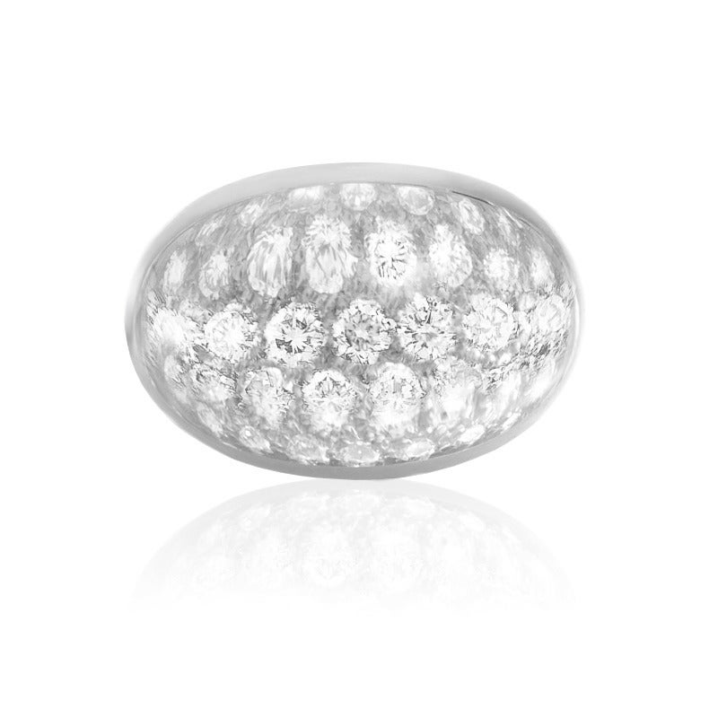 This attractive ring designed by the esteemed Cartier is made of splendid 18K white gold and accented with gorgeous crystal and sparkly diamonds.

Ring Size: 6.75 (53 3/8)