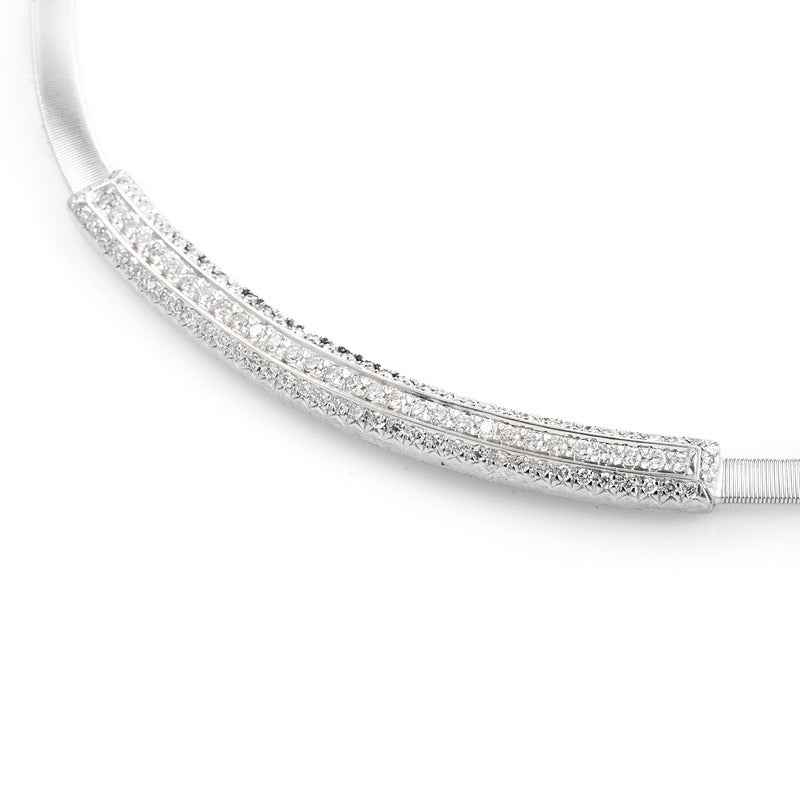 This refreshingly original collar necklace has a style that could only have come from a brand such as Marco Bicego. The necklace is made of 18K white gold and features an accent set with a gleaming ~1.18ct diamond pave.
Retail Price: $20,970.00