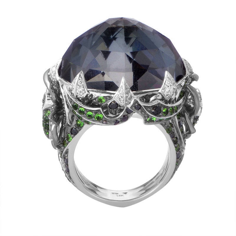 This magnificent ring by Stephen Webster features an extraordinary design with excellently crafted elements, even to the smallest of details. Hidden amidst its numerous tsavorite-set parts is even an admirably crafted and vivaciously set bug. The