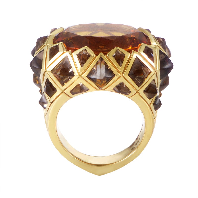 A spectacular ring by Stephen Webster made of attractive 18K yellow gold, boasting impressive offbeat design accented with splendid citrine and quartz stones.

Included Items: Manufacturer's Box
Ring Size: 7.25 (54 5/8)