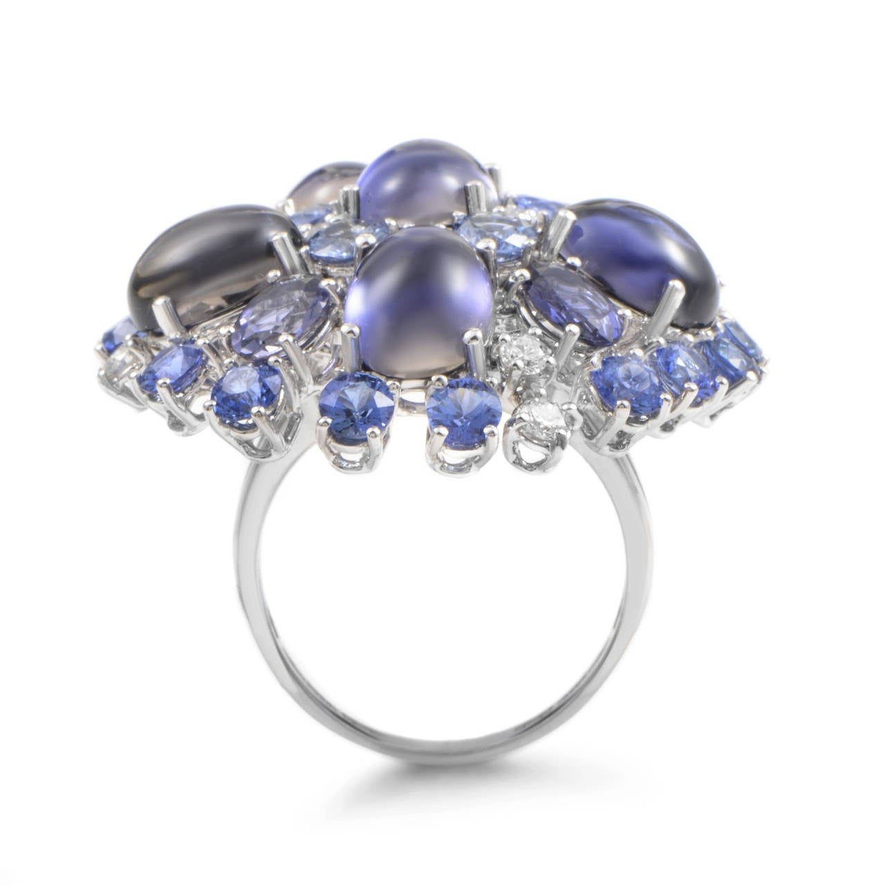 Gemstones are always a great choice for jewelry pieces and when four varieties of those are embedded in a single ring, the outcome is never conventional. This magnificent Roberto Coin piece is made of exemplary 18K white gold and  it is decorated