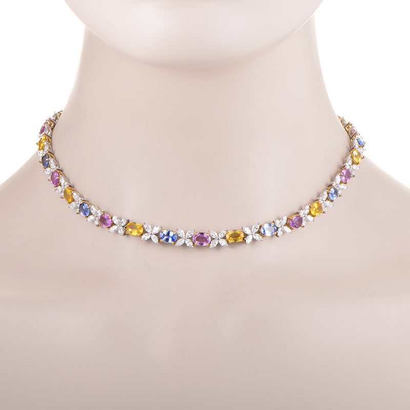 Strikingly vivacious and feminine necklace designed by the famous Tiffany & Co., decorated lavishly with 22.60 carats of attractive sapphire stones and 9.50 carats of graceful diamonds.
Included Items: Manufacturer's Box