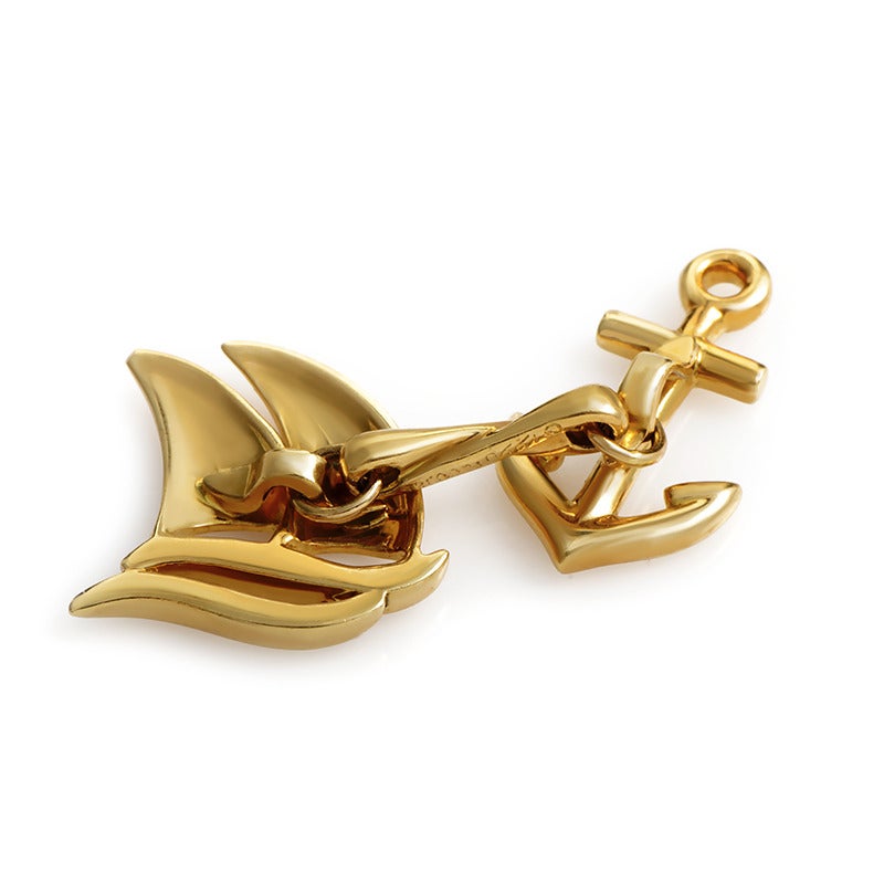 A stylish and extravagant accessory, this Tiffany & Co. pair features creative design inspired by the life at the sea, consisting of a splendidly crafted anchor and a boat. The pair is made of 18K yellow gold and each piece weighs seven grams.