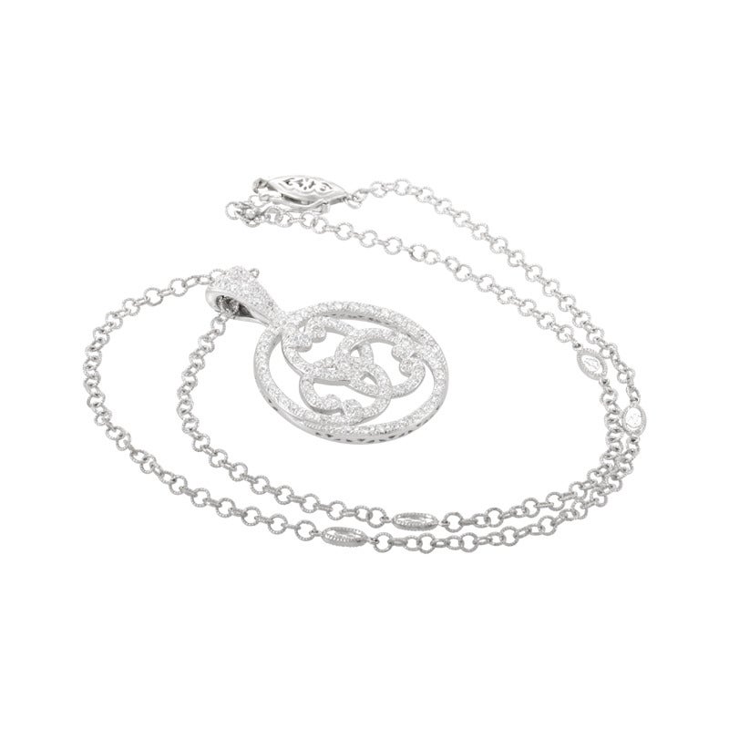 Three echoes of the Charriol initial entwine to create a Victorian motif with this dazzler of a necklace. 18K white gold cuts no corners with its looping pattern wrapped tight 0.87ct diamonds.

Included Items: Manufacturer's Pouch

Approximate