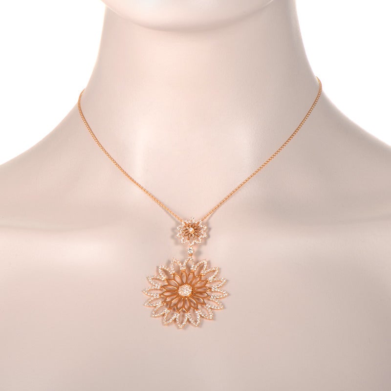 A charming and feminine piece from Crivelli, boasting a wonderful flower-shaped pendant embellished with numerous white diamonds. The necklace is made of 18K rose gold and features 18.75” rolo chain combined with a lobster claw clasp, with the total