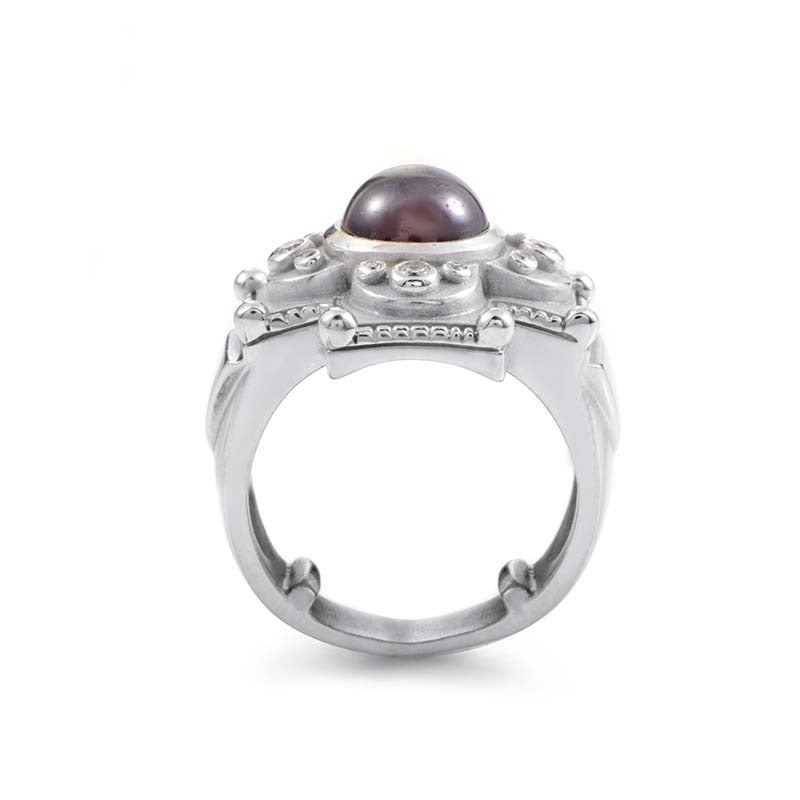 A striking, bold design from the esteemed Kieselstein-Cord, made of exemplary 18K white gold and accented with an attractive red tourmaline stone, additionally embellished with lavish diamonds totaling 0.25ct.
Ring Size: 4.75 (48 3/8)