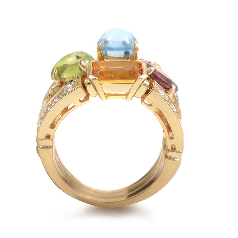 This ring from Bulgari's Allegra Collection is gorgeous and colorful. It is made of 18K yellow gold and boasts a design that features multi-colored gemstones and shanks set with glittering white diamonds.
Ring Size: 6.5 (52 3/4)