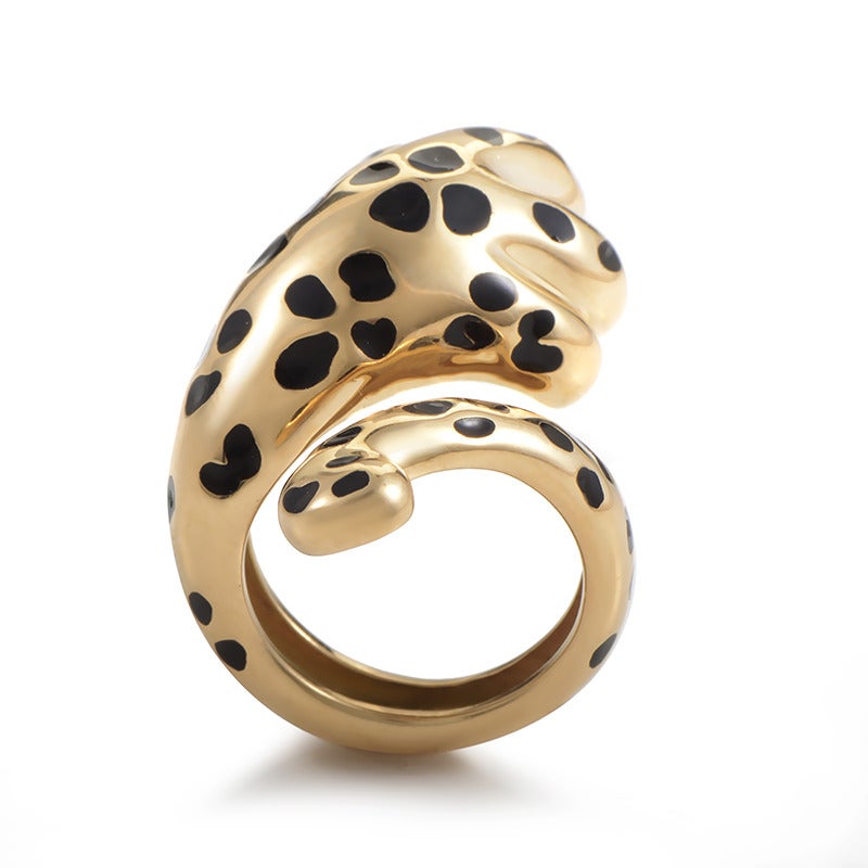 Imaginatively designed ring coming from the esteemed Dior, vividly depicting leopard paw; the ring is made of 18K yellow gold with black lacquer accents.
Included Items: Manufacturer's Box
Ring Size: 7.0 (54)