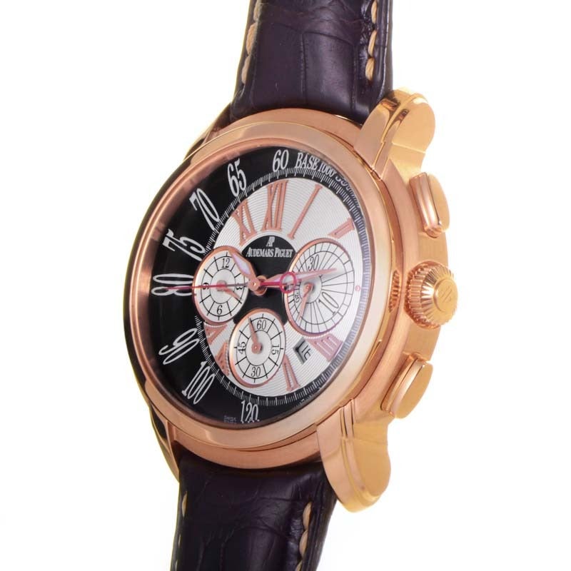 Audemars Piguet gents' 18K rose gold automatic wristwatch with matching bezel on a brown crocodile leather strap. Watch displays indication of hours, minutes, seconds, date and chronograph on a black and silver dial with rose gold accents. Watch