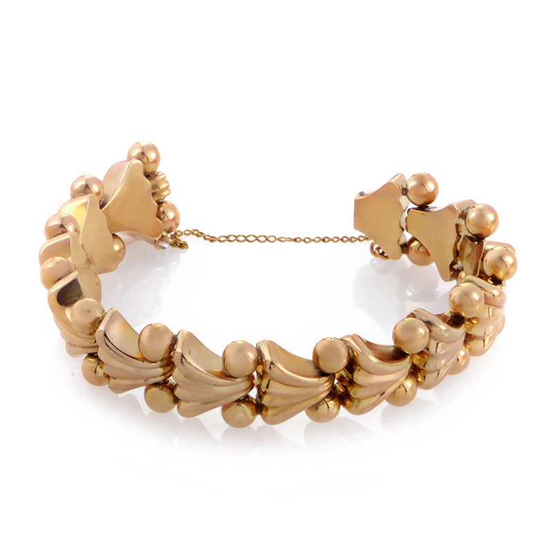 This bold, chunky design is the perfect accessory for a lady who loves to shine! The bracelet boasts a unique design made entirely of carved 18K rose gold.