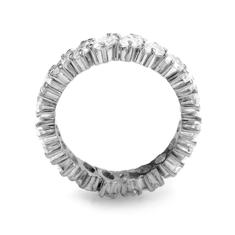 The harmonious glow of marquise-cut diamonds gives this eternity band a timeless and truly decadent look. The ring is made of platinum and is set with ~4.30ct of marquise-cut diamonds.