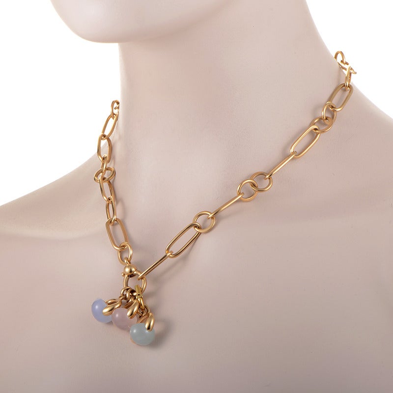 This design from Pomellato's Luna collection is quite eye-catching with its gleaming gold and colorful gemstone accents. The necklace is comprised of 18K yellow gold links and is accented with three Luna charm pendants.
Approximate Dimensions: Drop