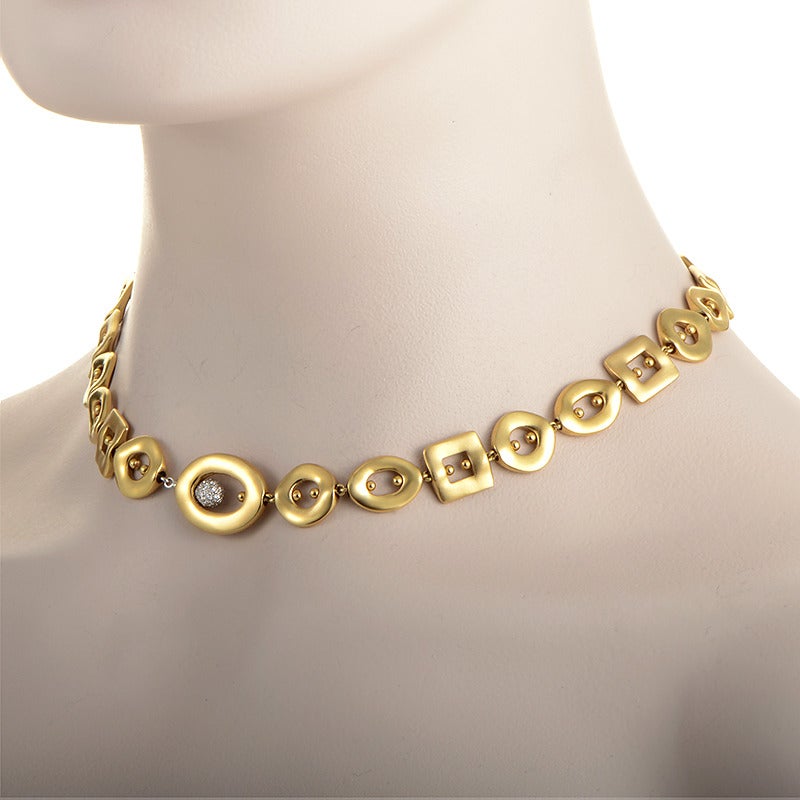 Gold formed into myriad shapes gives this Pomellato necklace an exotic and luxurious feel. The necklace is made of brushed 18K yellow gold except for a single, spherical white gold accent completely paved with ~.35ct of diamonds.
Retail Price:
