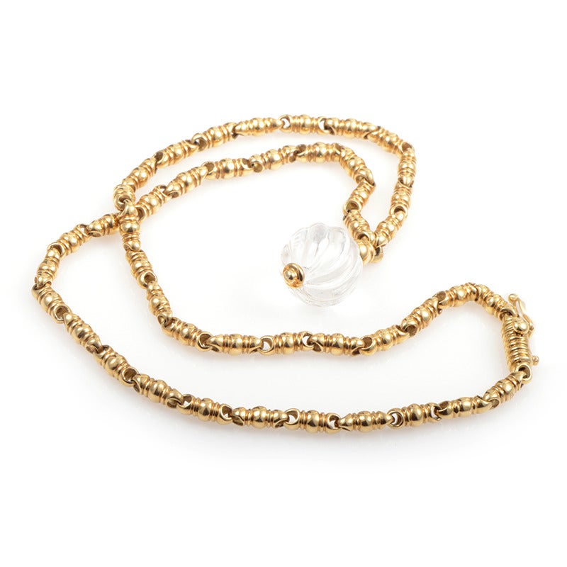 Alluring all the way from the box clasp to the pendant, this noteworthy necklace from Boucheron features a brilliantly designed 18K yellow gold chain and a wonderfully cut white quartz stone.

Approximate Dimensions:Drop of the Necklace: 8.50