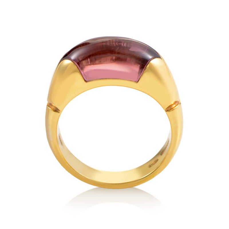 A marvelous, smooth tourmaline stone offers a beautiful play of light and takes the central spot of this nifty ring from Bulgari boasting 18K yellow gold body.
Ring Size: 6.25 (52 1/8), 6.75 (53 3/8)
Included Items: Manufacturer's Box
