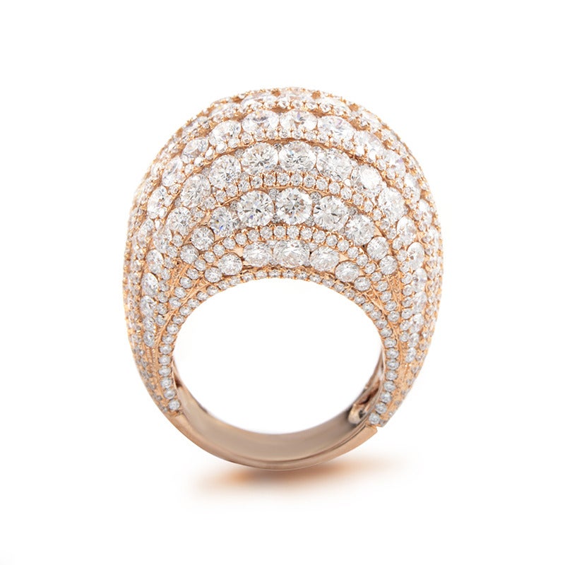 A seamless, jaunty feast for the eye with 18K gold body expanding upwards and outwards to host a stunning number of multi-sized diamonds totaling 9.48 carats in weight.

Ring Size:6.0 (51 1/2)