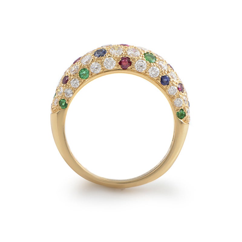 This dazzling ring from Van Cleef & Arpels achieves a marvelous multicolored-look due to a clever combination of rubies, sapphires and emeralds set with diamonds totaling approximately 1.50 carats on top of a stunning 18K yellow gold body.

Ring