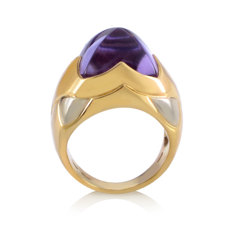 The luminous combination of sophisticated 18K yellow gold and elegant white gold is embellished with a single exceptionally cut amethyst stone in this gorgeous Bulgari ring.

Ring Size: 5.25 (49 5/8)