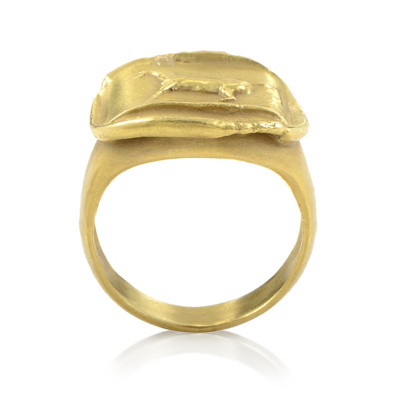 Unconventionally designed and crafted, this impressive ring by Kieselstein-Cord is made entirely of 18K yellow gold and features a simple, antique depiction of a horse on its upper side.
Ring Size: 6.75 (53 3/8)