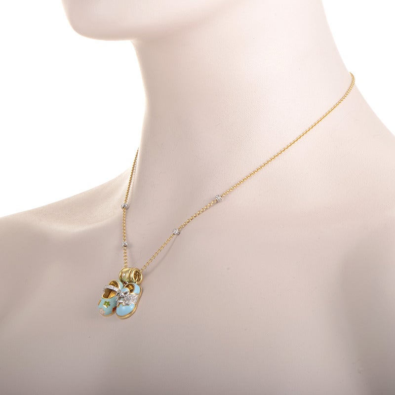 This adorable necklace from Aaron Basha is all the rage and perfect for a fashion-conscientious lady. The necklace is made of 18K yellow gold and features a chain studded with diamonds. Lastly, two adorable lacquered baby shoe charms dangle from the
