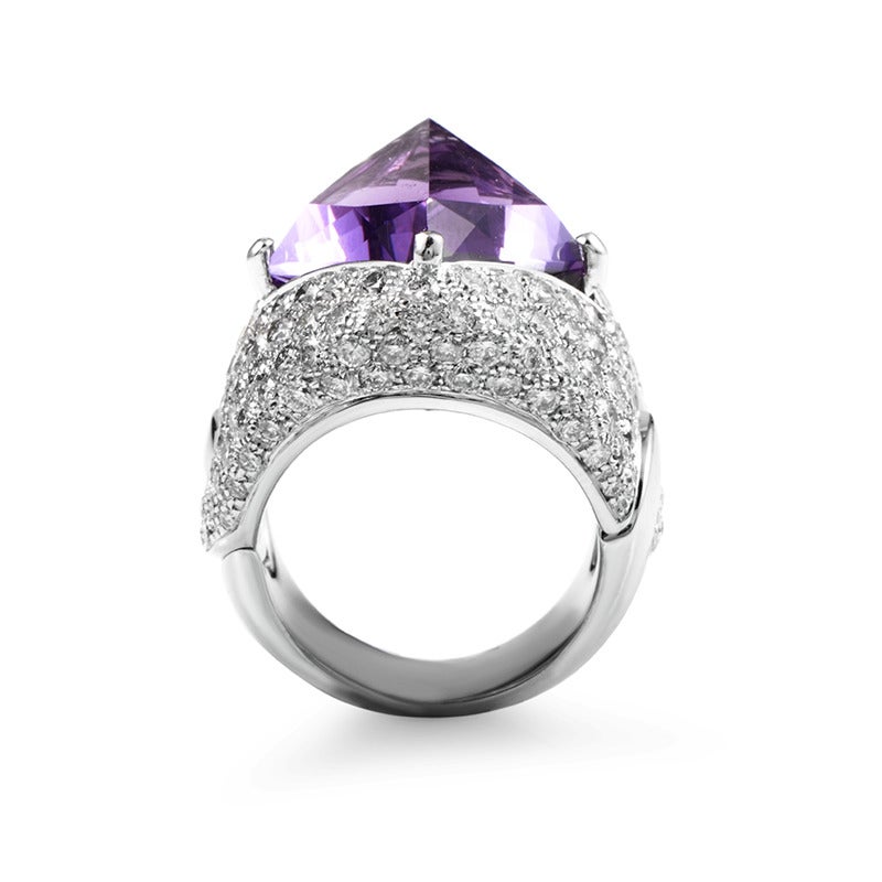 Take your fashion to the next level with this magnificent ring from Chimento's Illusione collection! The ring is made of 18K white gold and features shanks paved with glistening white diamonds. Lastly, an ~8.50ct purple amethyst steals the