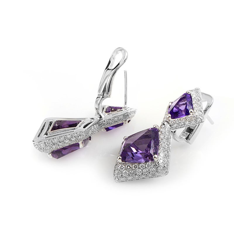 This pair of earrings from Chimento's Illusione collection are sure to dazzle and delight! The earrings are made of 18K white gold and are set with ~11.90ct of amethyst stones accented with ~2.56ct of white diamonds.
Retail Price: $21,700.00 (Plus