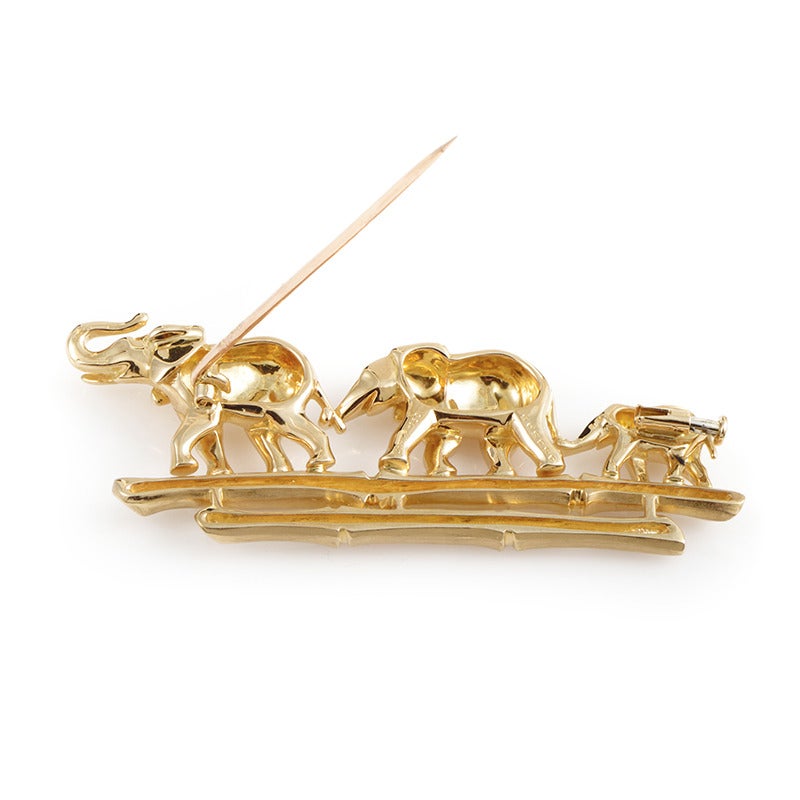 The Elephant Family design from the house of Cartier is always in style. This brooch is made of 18K yellow gold and displays a family of elephants walking in a procession line. Lastly, the adult elephants each have an eye made of emerald.