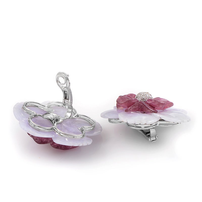 Delightfully romantic and feminine, these exceptional Sabbadini earrings depict graceful flowers, spectacularly crafted from chalcedony and amethyst stones accented with a glittering diamond pave.

Included Items: Manufacturer's Box