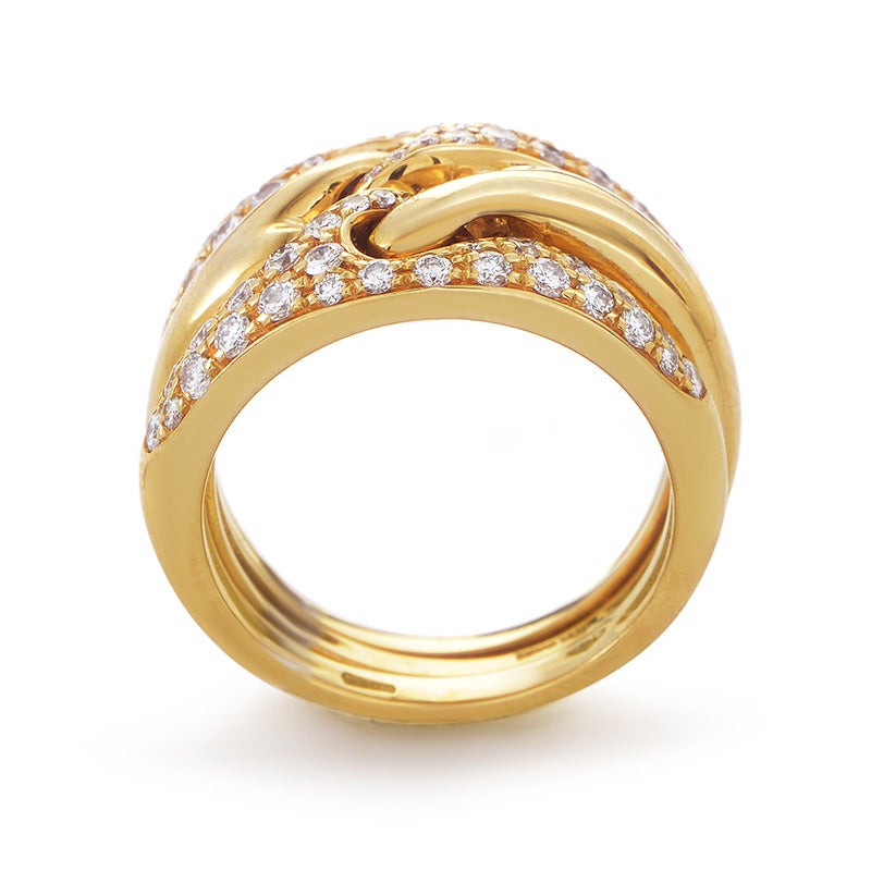 Set with a total of 0.85ct of sparkling diamonds, 18K yellow gold flows smoothly and entwines imaginatively to create a memorable, enchanting appearance for this astonishing, graceful ring from Bulgari.
Included Items: Manufacturer's Box
Ring