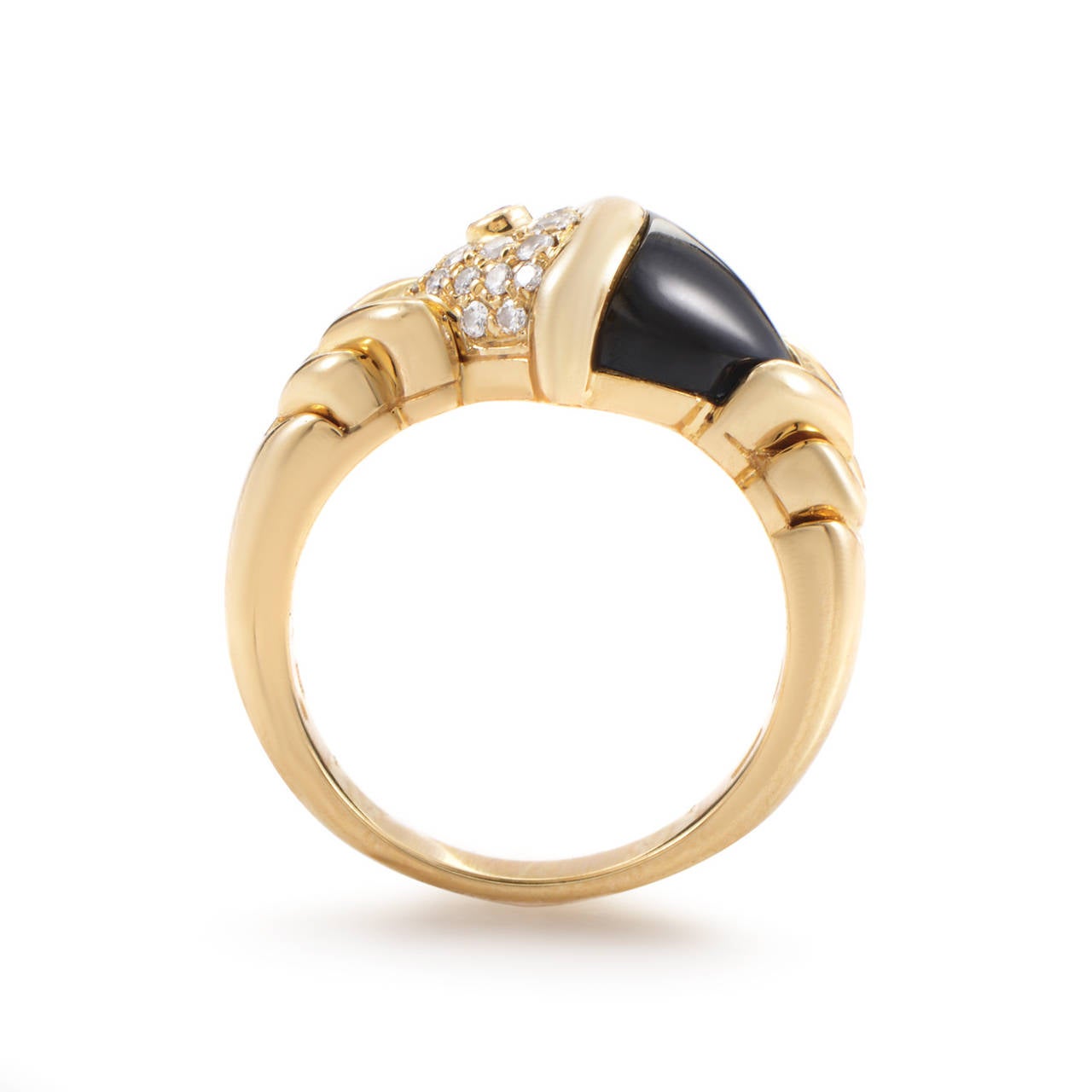 The allure of tourmaline combined with the dazzling elegance of diamonds makes this Bulgari ring a wonderful fashion accessory to accent any kind of wear. To top it off, it is made brushed and polished 18K yellow gold, giving it a very luxurious