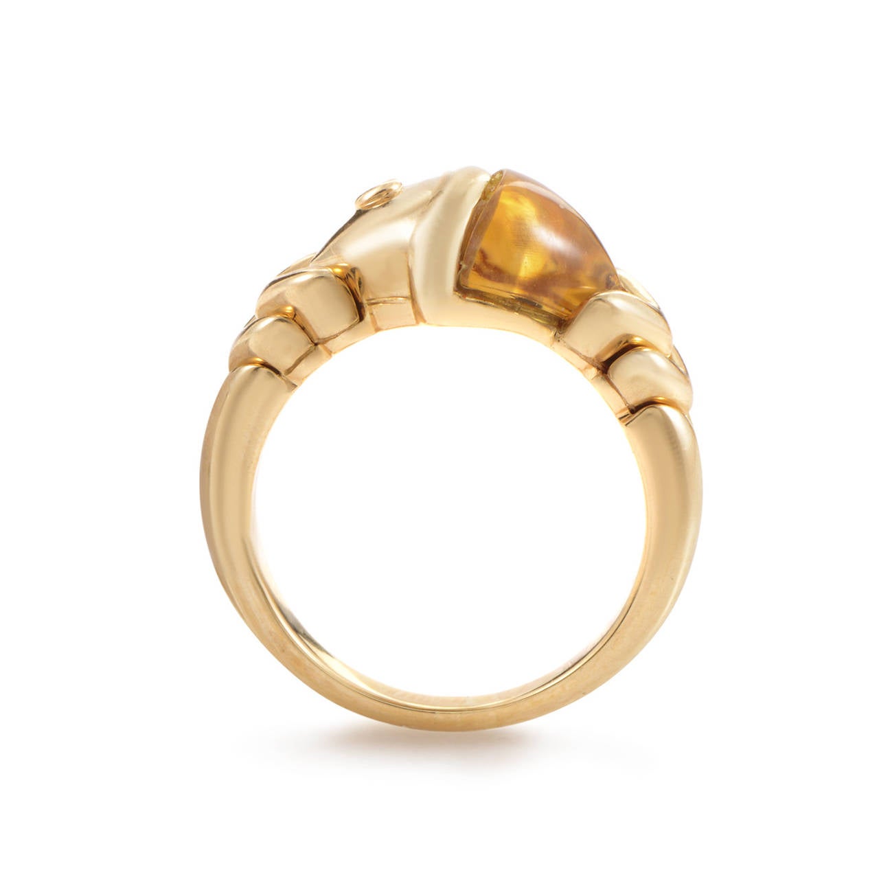 The allure of citrine combined with the dazzling elegance of diamonds makes this Bulgari ring a wonderful fashion accessory to accent any kind of wear. To complete the ring's glamorous look, it is made of polished 18K yellow gold, giving it a very