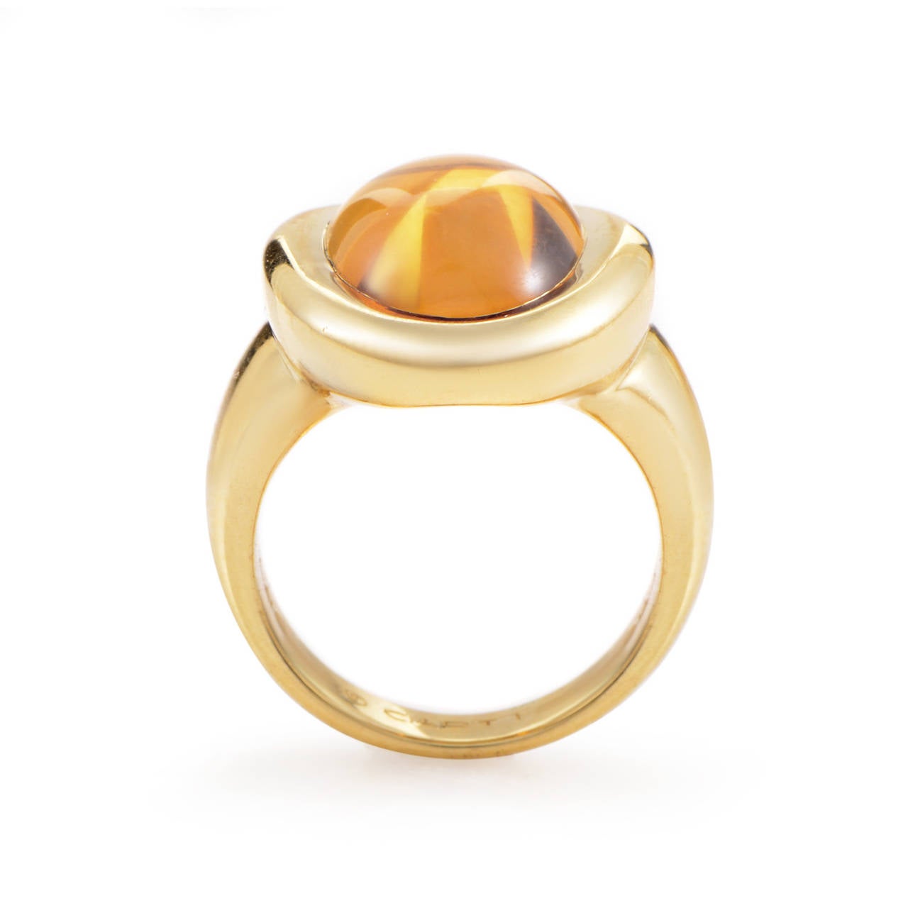 This gorgeous ring from Cartier shines with beauty and elegance. The ring is crafted from 18K yellow gold and boasts brilliant citrine cabochon that serves to accentuate the enduring beauty and allure of polished 18K yellow gold.
Ring Size: 6.75