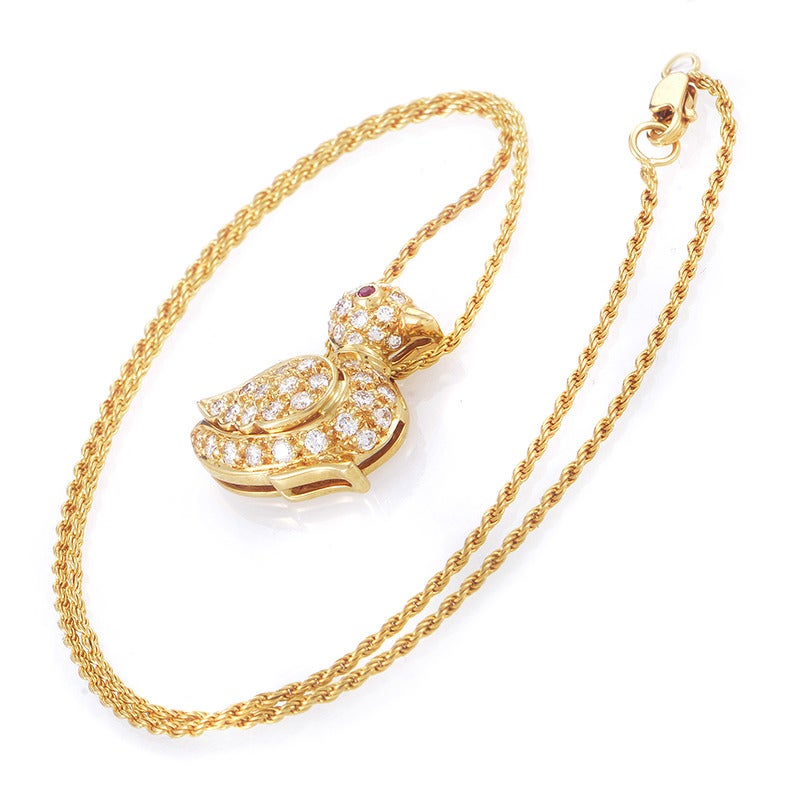 Attached to a creatively shaped 18K yellow gold chain, the fabulous pendant of this charming necklace from Graff is crafted in the form of a duckling, embellished with 0.83ct of diamonds sparkling against the gleaming warm backdrop.

Approximate