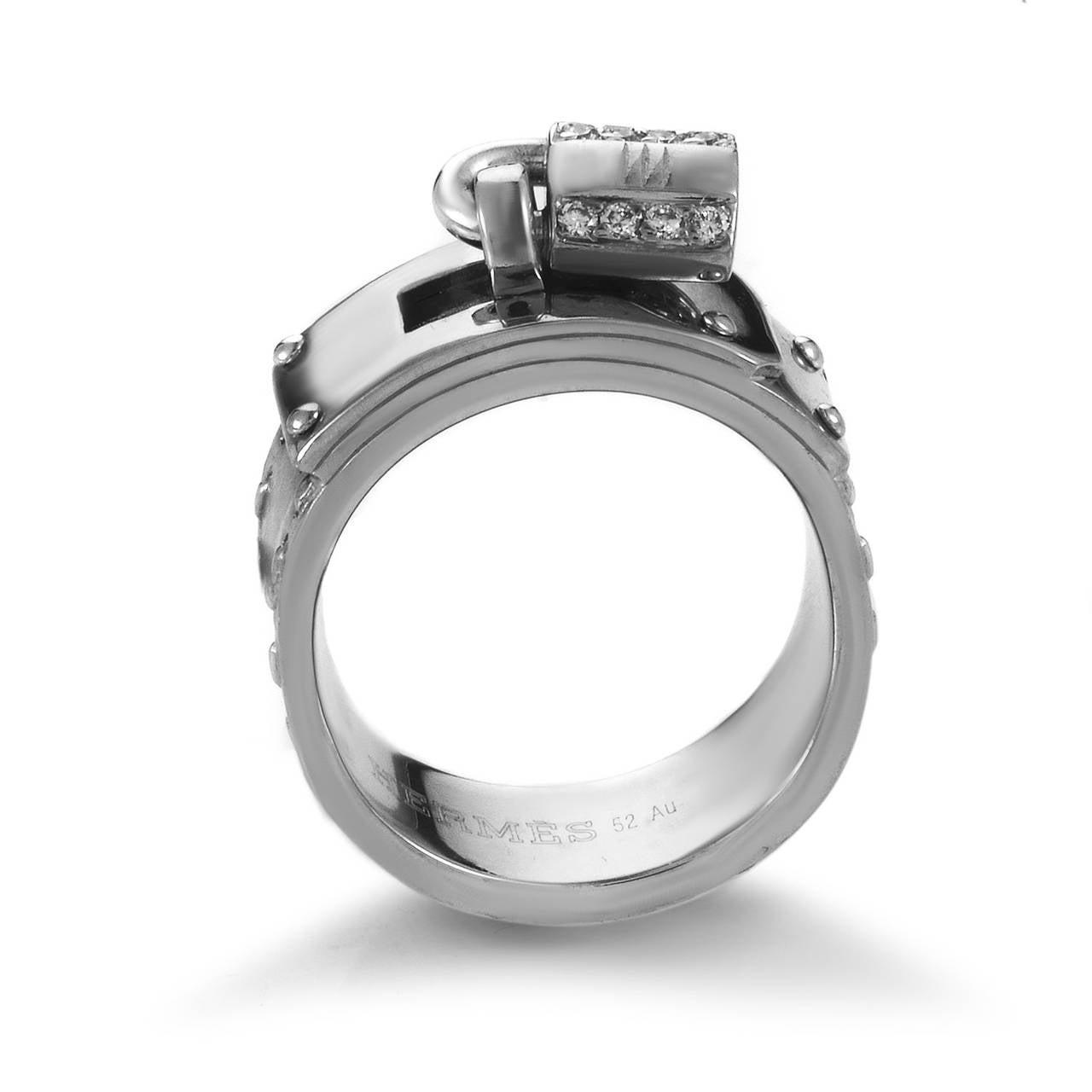 This daring design from Hermes that ventures off the beaten path features robust, raw allure with its memorable 18K white gold body boasting a lock-shaped decoration along with 0.16ct of harmoniously complementing diamonds.
Ring Size: 5.25 (49 5/8)