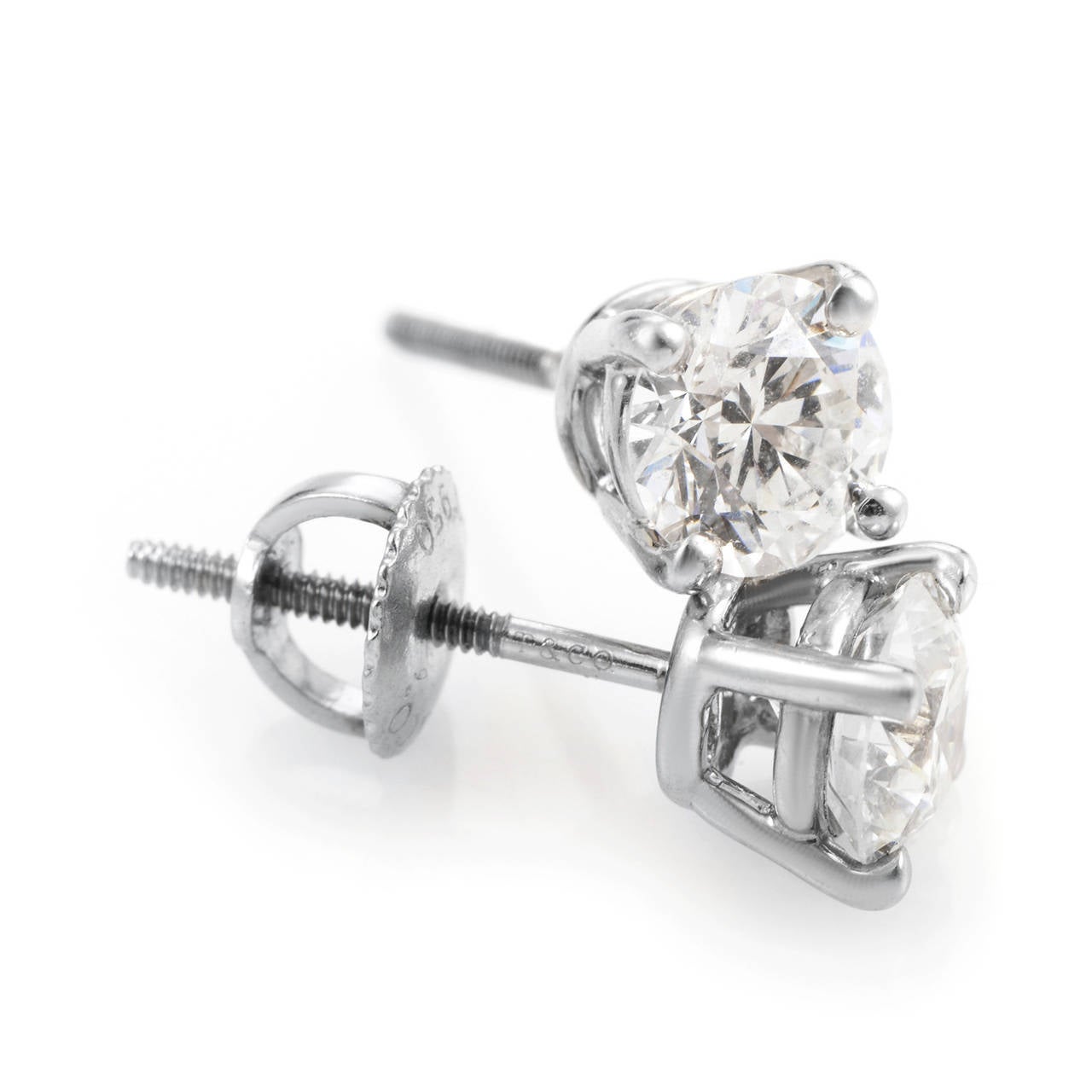 Boasting a pair of astonishing H-color VS1 and VS2 brilliant-cut diamonds, weighing 0.74ct and 0.75ct respectively, these glamorous platinum earrings from Tiffany & Co. exude sophisticated elegance and offer a sublime luxurious look.
Included