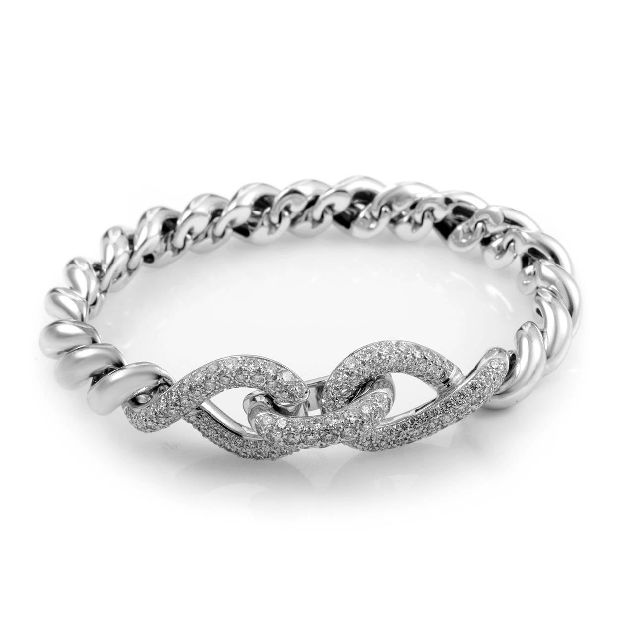 This bracelet boasts a classic design perfect for the lady who enjoys elegant luxuries. The bracelet is made of 18K white gold and boasts an integrated clasp set with a pave of white diamonds.

Diamond Carat Weight: 3.00