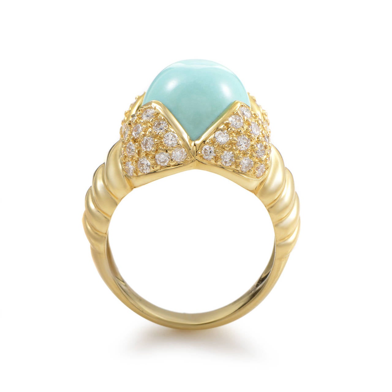 The sumptuous design of this Arrezo ring is sure to garner much attention. The ring is made of glistening 18K yellow gold and boasts shanks partially set with a pave of 1.05 carats of diamonds. Lastly, the main stone is a magnificent egg-shaped