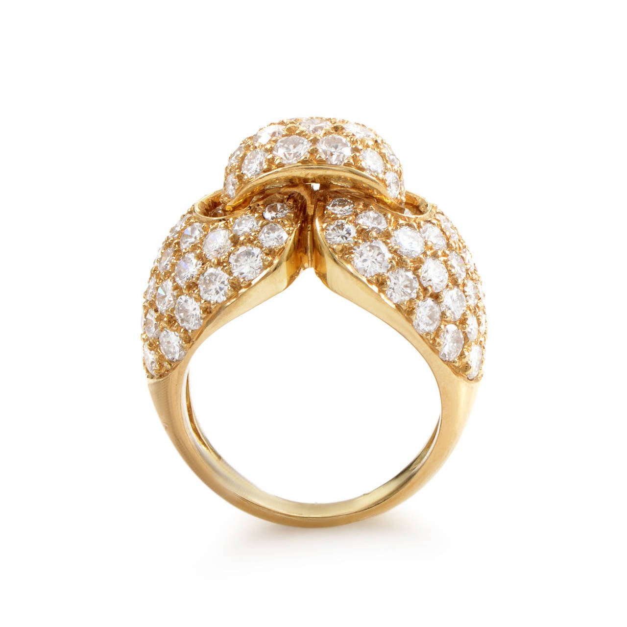 A sophisticated, graceful design from Boucheron made of elegant 18K yellow gold, featuring a unique knotted design and a sumptuous 3.70 carat diamond pave.

Ring Size: 6.0 (51 1/2)