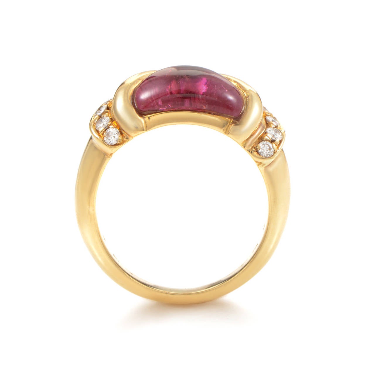 This ring from Bulgari has a vibrant design that is is made only more spectacular by the combination of a colored gemstone and diamonds. The ring is made of 18K yellow gold and is set with a pink tourmaline stone. Lastly, the bezel is accented with