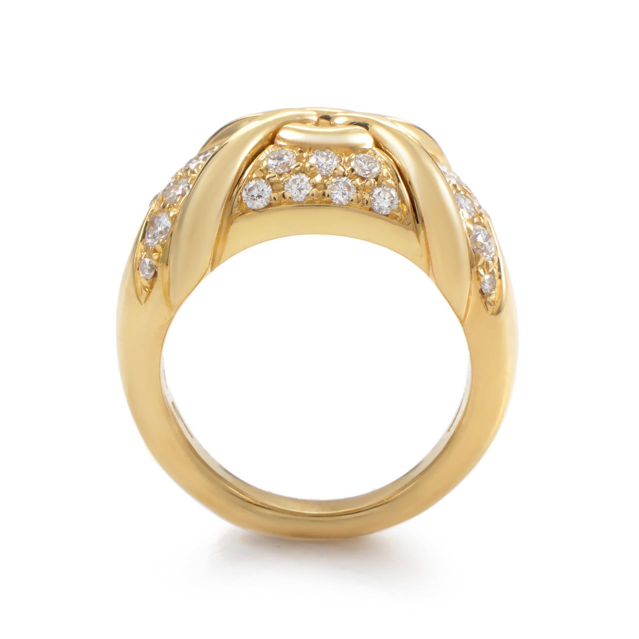 This gorgeously crafted piece of fine jewelry from Bulgari shines with the ethereal glow of precious gemstones. The ring is made of 18K yellow gold and is set with a lovely .75 carat diamond pave.
Included Items: Manufacturer's Box
Ring Size: 5.25