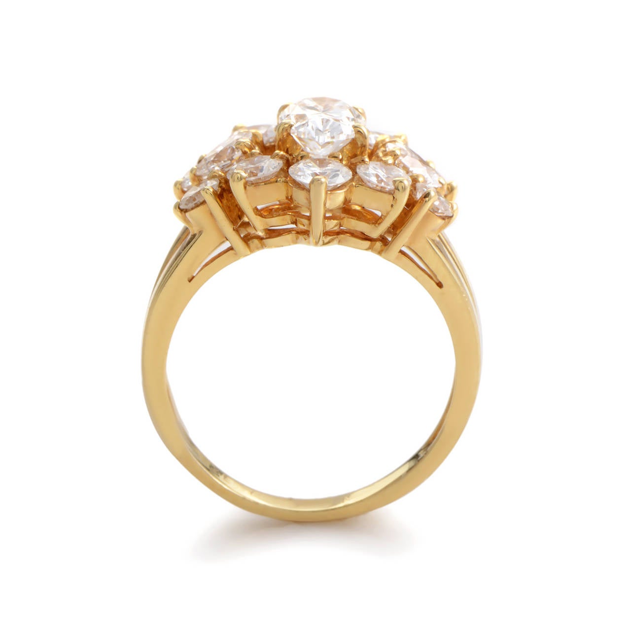 This ring from Chaumet has a decadent design that glitters with a fiery glow. The ring is made of 18K yellow gold and boasts a .75 carat diamond center surrounded by 1.50 carats of diamonds.

Ring Size: US 5.75 (50 7/8)