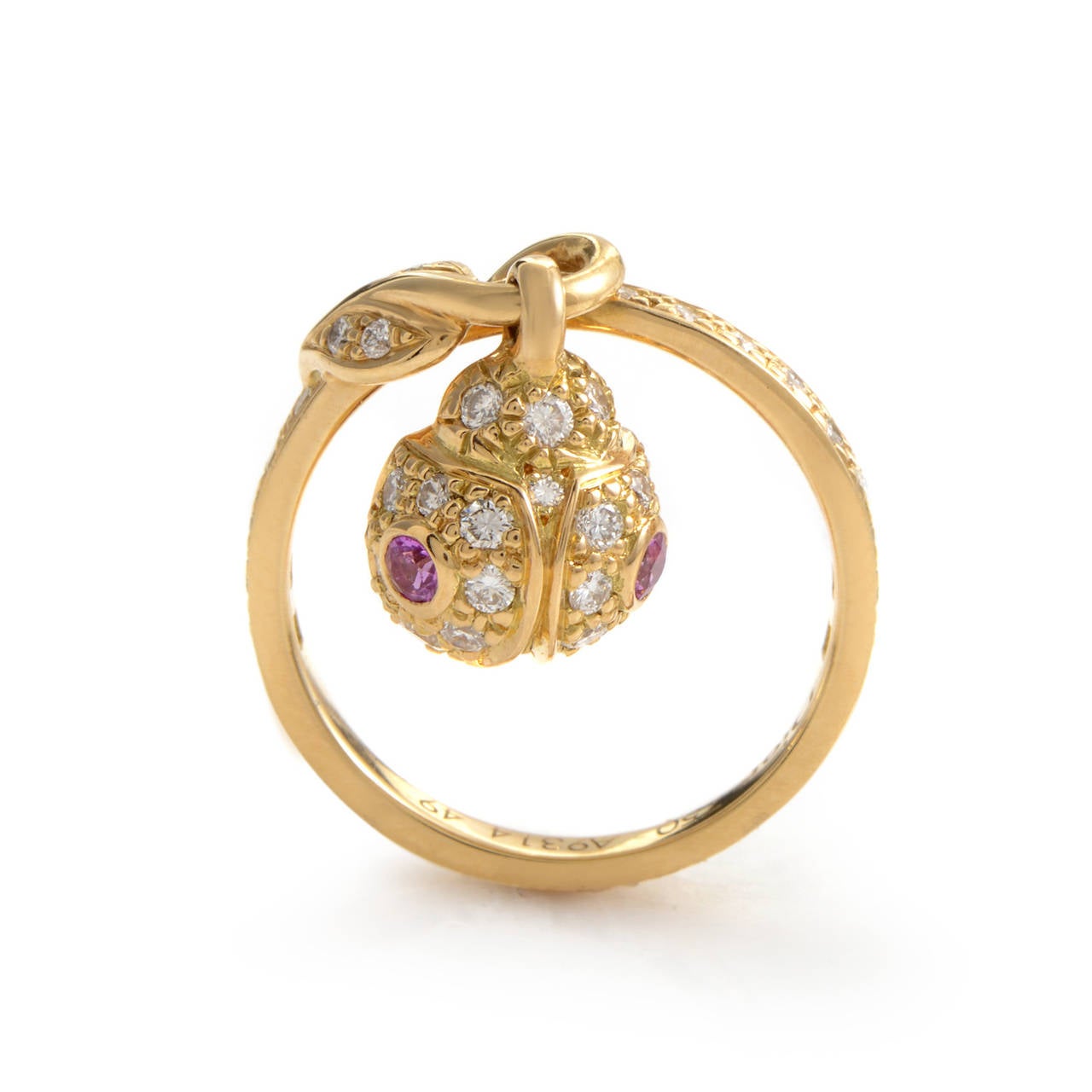 This ring from Dior has a fabulous design that is tasteful, while also playful. It is made of 18K yellow gold and boasts a dangling ladybug charm. Lastly, the design is accented with white diamonds and pink sapphires.
Ring Size: 4.75 (48