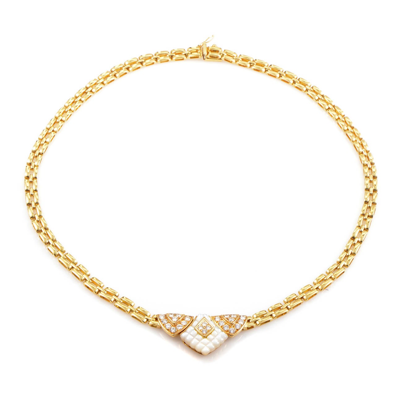 Classy and feminine, this gorgeous Mauboussin necklace is made of attractive 18K yellow gold and boasts a delightful pendant set with mother of pearl and 1.45 carats of glittering white diamonds.

Approximate Dimensions:
Drop of the Necklace: