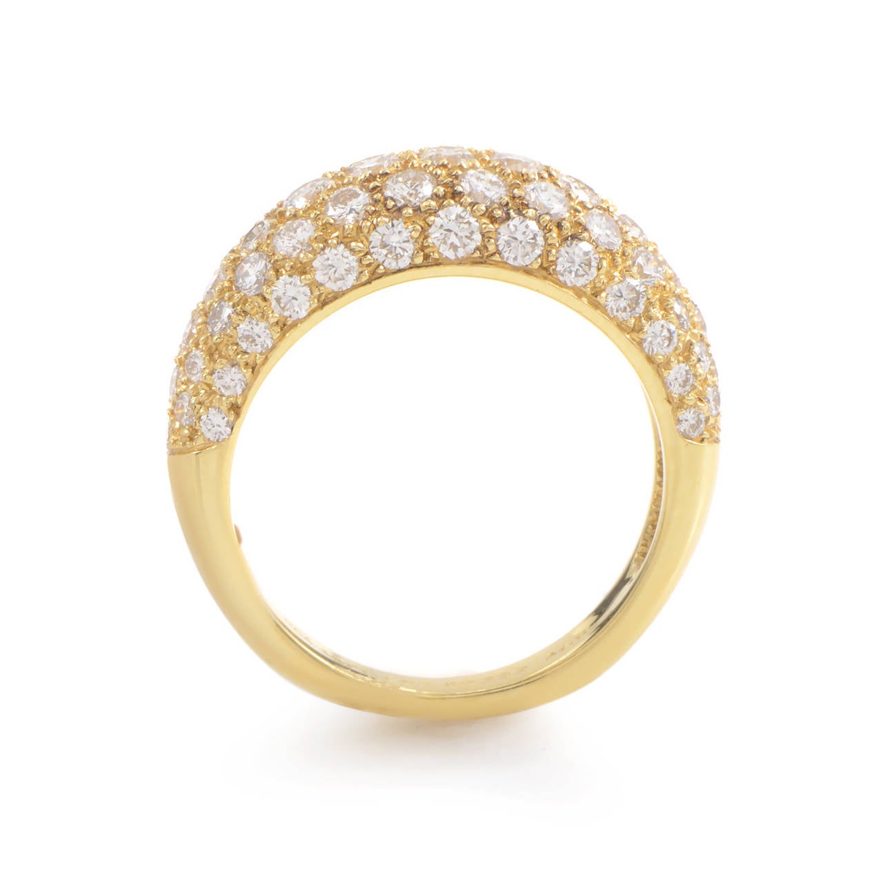 The delicate shimmer of diamonds paired with the timeless glow of gold makes this band ring from Van Cleef & Arpels a must-have design. The ring is made of 18K yellow gold and is set with an ~.75ct partial diamond pave.

Ring Size: 5.75 (50 7/8)